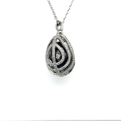 Rough Diamond Set in 18 Karat White Gold Cage With Accent Diamonds at Regard Jewelry in Austin, - Regard Jewelry