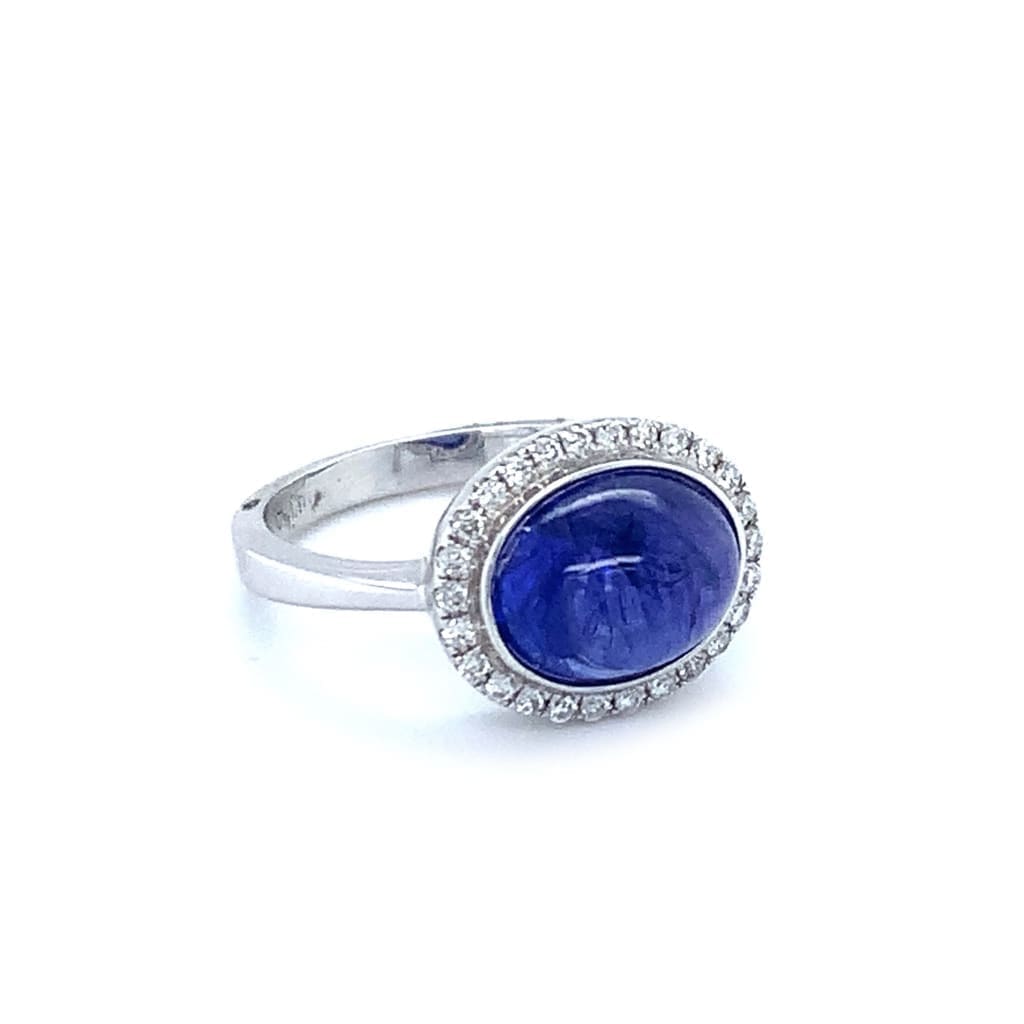 TANZANITE RING WITH OVAL DIAMOND HALO IN AUSTIN, TX. - Regard Jewelry