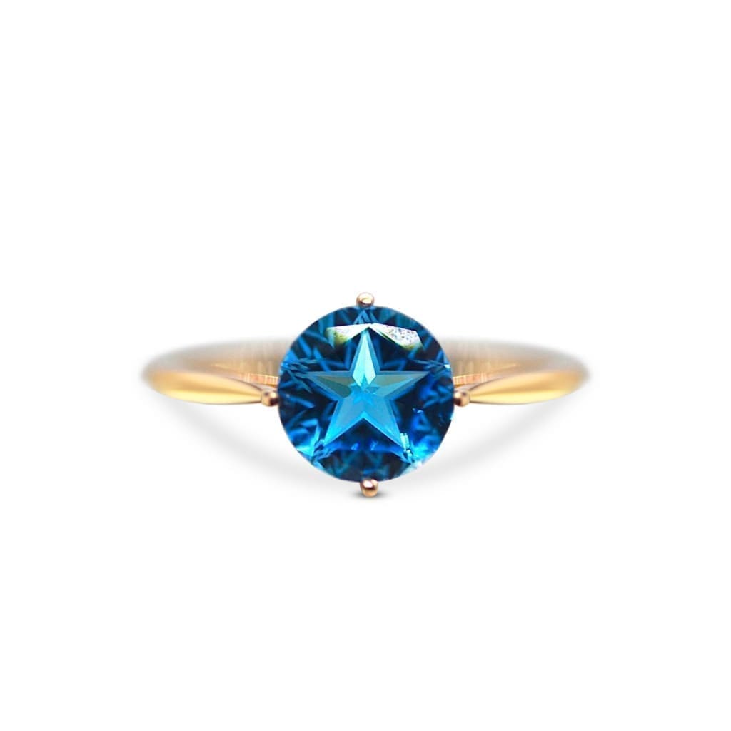 TEXAS STAR CUT BLUE TOPAZ RING IN AUSTIN, TX. - Regard Jewelry